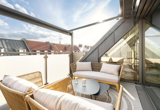 Dachgeschoss Balkon mit Loungemöbeln